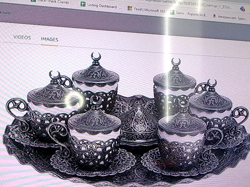 27-Piece Ornate Coffee Cup and Saucer Set