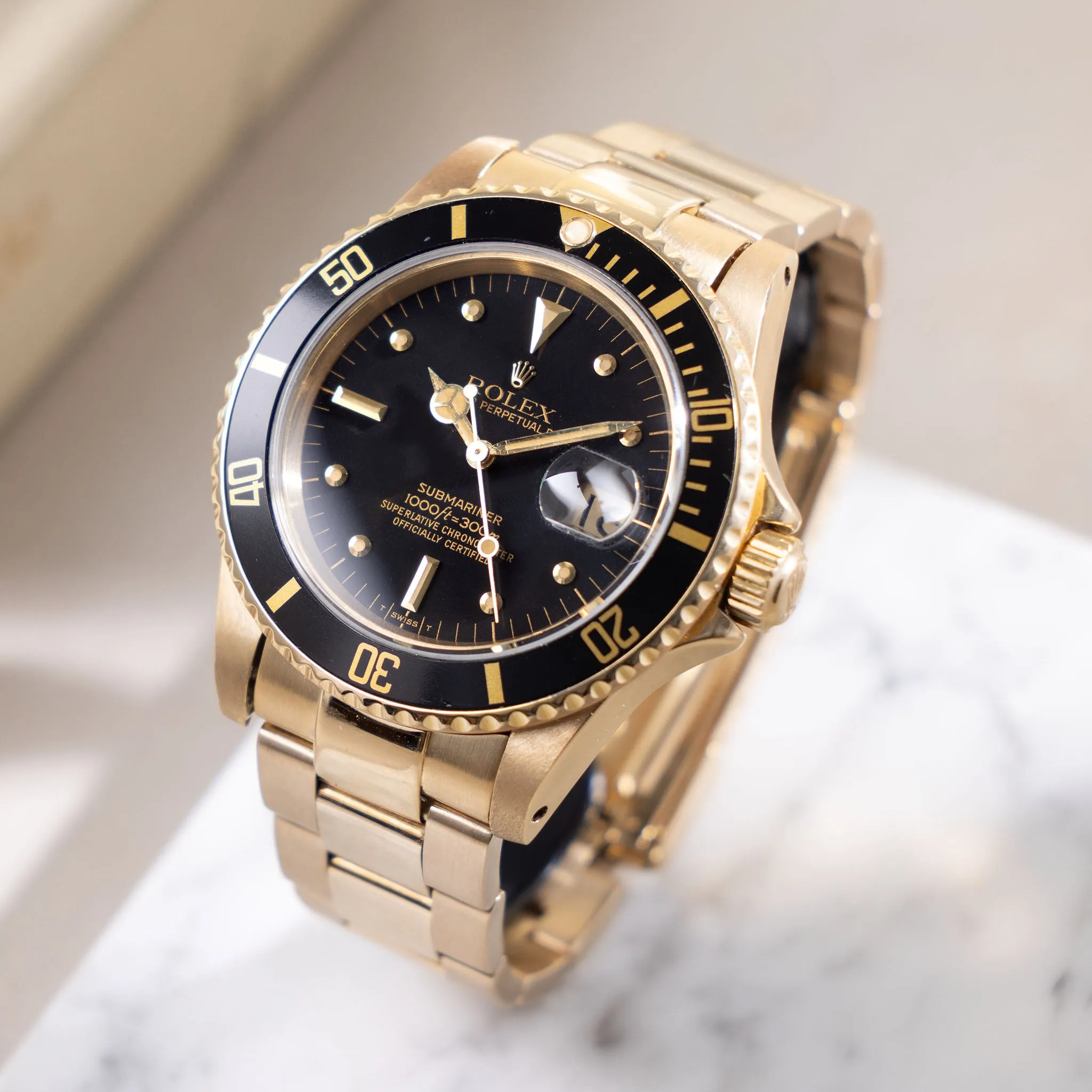 Rolex Submariner Date in 18k  gold ref. 16808 with black nipple dial Box and Papers